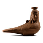 Rhodian, circa 550–500 B.C. A mould-made vessel with the body of a bird and the head of youthful female with her head turned right, hair arranged in l...