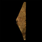 2nd century B.C. A triangular sheet-gold panel with repoussé flowers and tendrils; mounted on a perspex backing. 45.56 grams total, 15 cm wide (18 cm ...
