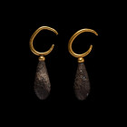 1st century B.C.-1st century A.D. Matched pair, each a gold open loop with bulb below supporting a silver imitation fig. 12.3 grams total, 41-42 mm (1...