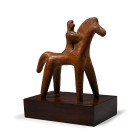 Mid 6th century B.C. In static stance with forelegs straight and head erect, rider gripping the neck, painted detailing to mane and body; mounted on a...