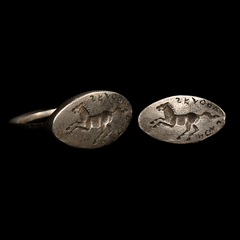 Greek Silver Ring for Skythos. Circa 5th century B.C. Ellipsoid bezel with incus...