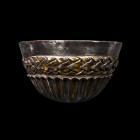 2nd-1st century B.C. A heavy hemispherical vessel with simulated braid beneath the rim and Hercules' knot; the body with lotus-flower ornament. See Pf...