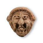 Greek Terracotta Face of a Gorgoneion. 6th-5th century B.C.