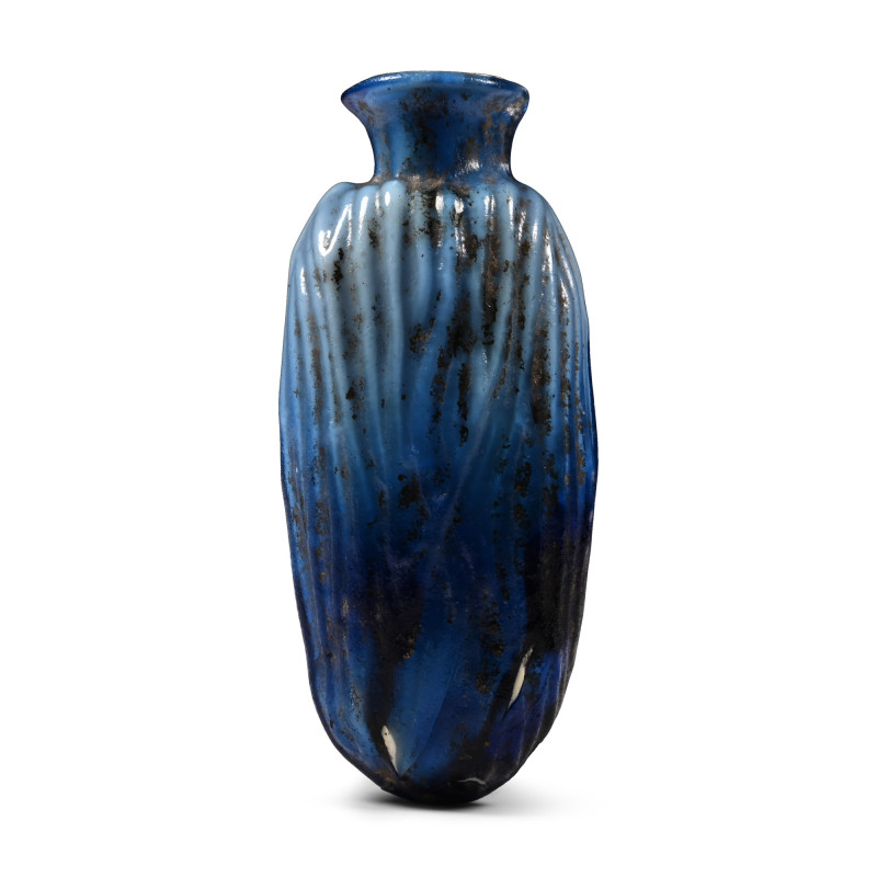 Roman Deep Blue Glass Date Flask. 1st century A.D. Mould-blown with elliptical b...
