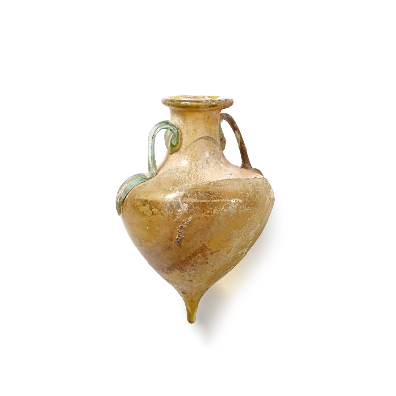 Roman Yellow Glass Amphora. 3rd-4th century A.D. With broad rounded shoulder tap...