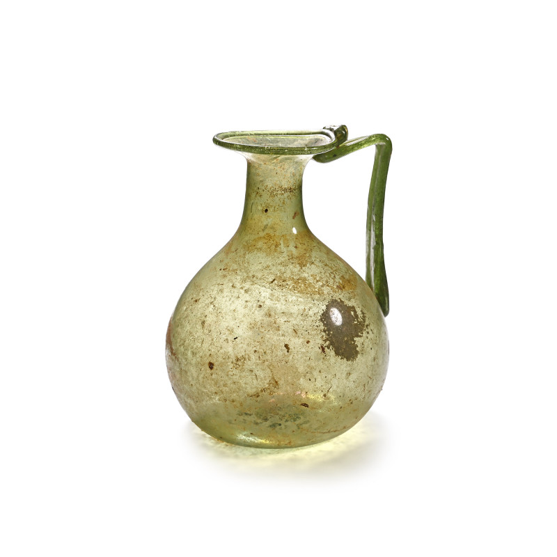 Roman Translucent Green Glass Flask. 1st-4th century A.D. Comprising a bulbous b...