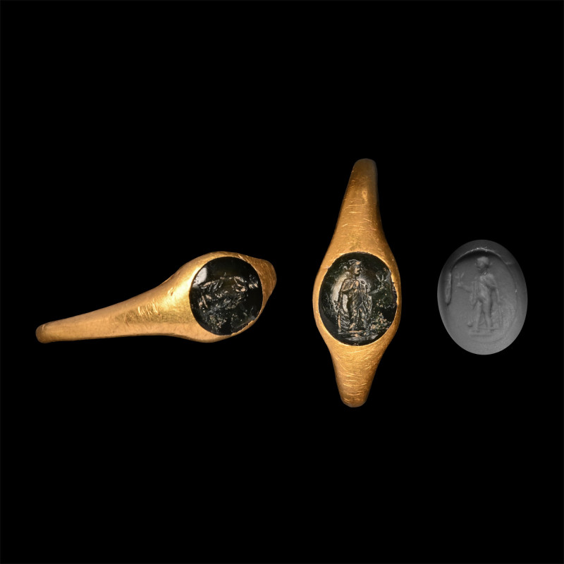 Roman Gold Ring with Spes Gemstone. 1st century A.D. Slender hoop and integral l...