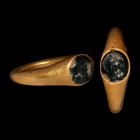 Roman Gold Ring with Eros Gemstone. 1st-2nd century A.D.