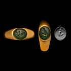 Roman Gold Ring with Green Quartz Gemstone of a Crouching Figure. 2nd-3rd century A.D.