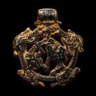Scandinavian Viking Silver-Gilt Oseberg Style Gripping Beast Pendant. Late 10th-early 11th century A.D.