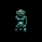 Egyptian Blue Glazed Faience Figure of Pataikos. Saite Period, 26th Dynasty, 664-545 B.C.