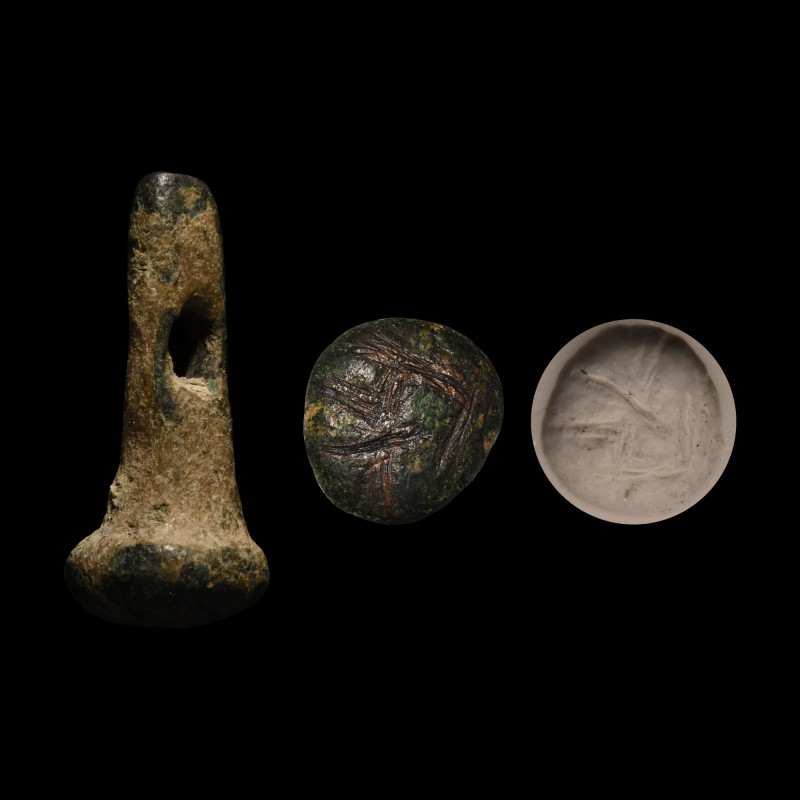 Phoenician Bronze Stamp Seal. Late 1st millennium B.C. With domed head and pierc...