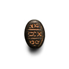 Phoenician Inscribed Bronze Scaraboid Seal. Late 1st millennium B.C.
