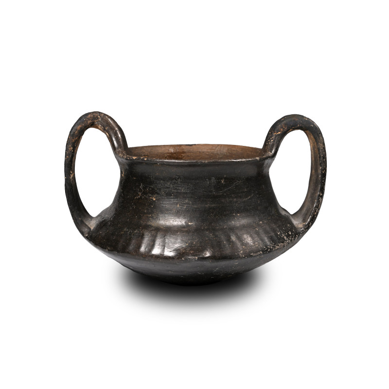 Villanovan Terracotta Two-Handled Bowl. 9th-8th century B.C. A squat vessel with...