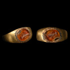 Roman Bronze Ring with Clasped Hands Gemstone. 2nd-3rd century A.D.