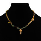 Roman Yellow Glass and Faience Bead Necklace String. 1st-4th century A.D. and later