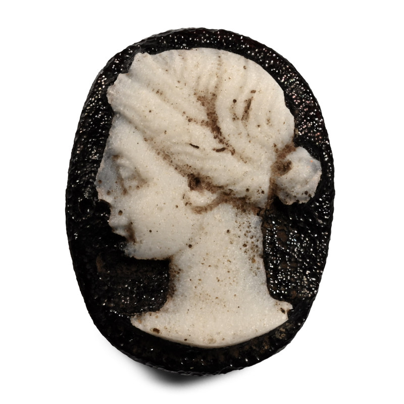 Roman Glass Cameo with Female Bust. 1st century A.D. Ellipsoid black glass plaqu...