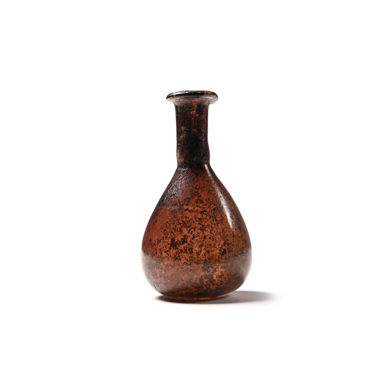 Roman Aubergine Glass Bottle with Iridescence. 2nd-4th century A.D. With pear-sh...