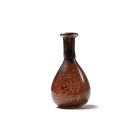 Roman Aubergine Glass Bottle with Iridescence. 2nd-4th century A.D.
