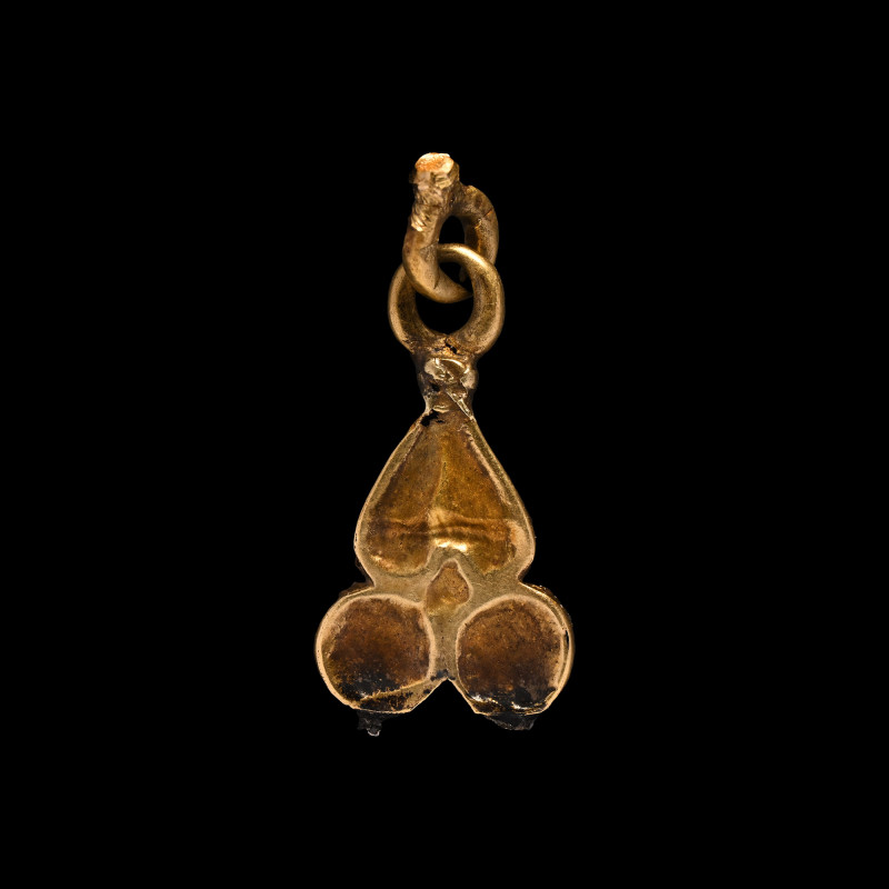 Medieval Gold 'Cherry' Pendant. Circa 14th-16th century A.D. Comprising an inver...