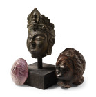 Bronze and Stone Head Group. 20th century A.D.