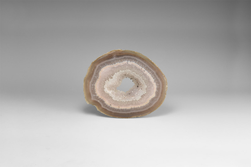 Polished Pastel Agate Geode Slice. A thick cut and polished slice with banded ag...