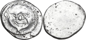 Greek Italy. Etruria, Populonia. AR 10 Units. First Metus Group, c. 425-400 BC. Obv. Head of Metus facing, hair bound with diadem; below, X. Rev. Blan...