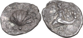 Greek Italy. Southern Apulia, Tarentum. AR Hemiobol, 281-235 BC. Obv. Cockle shell. Rev. Eros riding on dolphin left, holding kantharos; below, ΦΙ. Vl...