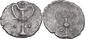 Greek Italy. Southern Apulia, Tarentum. AR Obol, c. 280-228 BC. Obv. Kantharos; three pellets around. Rev. Kantharos; three pellets around. HN Italy 1...