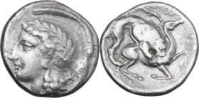 Greek Italy. Northern Lucania, Velia. AR Stater, 440-400 BC. Obv. Head of Athena left, wearing helmet decorated with wreath. Rev. Lion pulling down st...