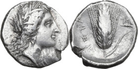 Greek Italy. Southern Lucania, Metapontum. AR Stater, c. 330-290 BC. Obv. Head of Demeter right, wearing wreath of grain, triple-pendant earring, and ...