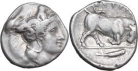 Greek Italy. Southern Lucania, Thurium. AR Nomos, 400-350 BC. Obv. Head of Athena right, wearing helmet decorated with Scylla. Rev. Bull butting right...
