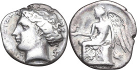 Greek Italy. Bruttium, Terina. AR Drachm, 299-289 BC. Obv. ΤΕΡΙΝΑΙΟΝ. Head of nymph left; behind, triskeles. Rev. Nike seated left on plinth, holding ...