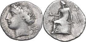 Greek Italy. Bruttium, Terina. AR Drachm, 299-289 BC. Obv. ΤΕΡΙΝΑΙΟΝ. Head of nymph left; behind, triskeles. Rev. Nike seated left on plinth, holding ...