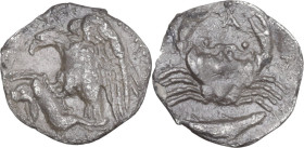 Sicily. Akragas. AR Hemidrachm, 420-410 BC. Obv. Eagle on hare left. Rev. Crab; below fish. HGC 2 103. AR. 0.85 g. 14.5 mm. RR. Nicely toned. Slightly...