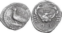 Sicily. Akragas. AR Litra, c. 450-440 BC. Obv. AK-PA (retrograde). Eagle standing left on Ionic capital. Rev. Crab; retrograde ΛI (mark of value) belo...