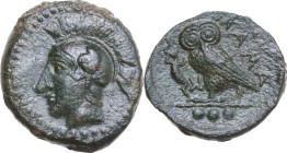 Sicily. Kamarina. AE Tetras, 425-405 BC. Obv. Head of Athena left, wearing helmet decorated with wing. Rev. Owl standing left, head facing, wings clos...