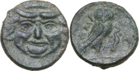 Sicily. Kamarina. AE Onkia, c. 420-410 BC. Obv. Facing gorgoneion with protruding tongue. Rev. KAMA. Owl standing right, head facing, wings closed, ho...