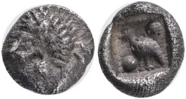 CARIA, incertum. Mylasa or Miletos (?). AR Tetartemorion, c. 420-390 BC. Obv. Forepart of Lion right. Rev. Bird within rectangular incuse, two dots in...