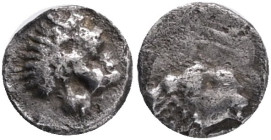 CARIA, Uncertain. circa 400-340 BC. AR Tetartemorion . Head of ram right / Roaring lion's head right. Troxell, "Carians in Miniature," Studies Mildenb...