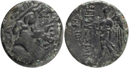 CILICIA. Elaioussa Sebaste.(1st century BC).Ae. Obv : Head of Zeus right, wearing taenia; AP behind. Rev : EΛAIOYΣIΩN. Nike avdancing left, holding wr...