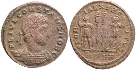 Constans, as Caesar, Æ Nummus. Antioch, AD 335-337. Obv.:FL IVL CONSTANS NOB C, laureate and cuirassed bust right. Rev.: GLORIA EXERCITVS, two helmete...