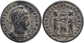 CONSTANTINE I. 307-337 AD. Follis. 318-319 AD. Ticinum.Obv.:IMP CONSTANTINVS MAX AVG, laureate, helmeted and cuirassed bust to right. Rev.: VICTORIAE ...