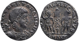 Constantinus 337-350. Æ Antioch, 335. Laureate and cuirassed bust r. R/ Two soldiers standing, facing each other, standard between them; SMANZ. RIC VI...