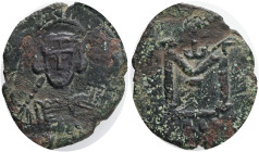 Byzantine, Constantine IV (668-685). Æ 40 Nummi Syracuse, 681-685. Helmeted and cuirassed facing bust, holding spear over shoulder. R/ Large M; monogr...