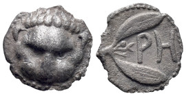 Bruttium, Rhegion, c. 415/0-387 BC. AR Litra (11mm, 0.71g). Facing lion's head. R/ PH within olive sprig. HNItaly 2499; SNG ANS 670-4. VF