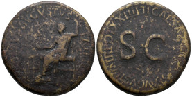 Divus Augustus (died AD 14). Æ Sestertius (34mm, 26g). Rome, 22-3. Augustus, radiate, seated l., resting feet on stool, holding laurel branch and scep...