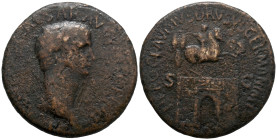 Claudius (41-54). Æ Sestertius (34.5m, 23.73g). Rome, 41-2. Laureate head r. R/ Arch of Nero Claudius Drusus: triumphal arch surmounted by trophies an...