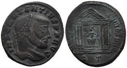 Maxentius (306-312). Æ Follis (26.5mm, 7.22g). Rome, 308-310.. Laureate head r. R/ Roma seated facing, head l., within hexastyle temple, holding globe...