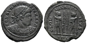 Constantine II (Caesar, 316-337). Æ Follis (17mm, 2.32g). Lugdunum, 330-1. Laureate and cuirassed bust r. R/ Two soldiers, each holding spear and shie...